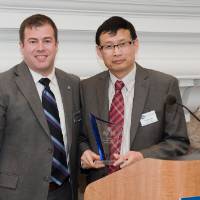 winner accepts award